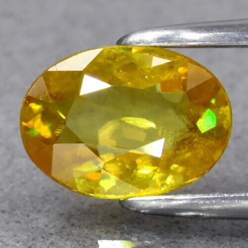 Sphene. Approx.  .8cwt.  Natural Earth Mined.  7x5x2.5mm. See Video
