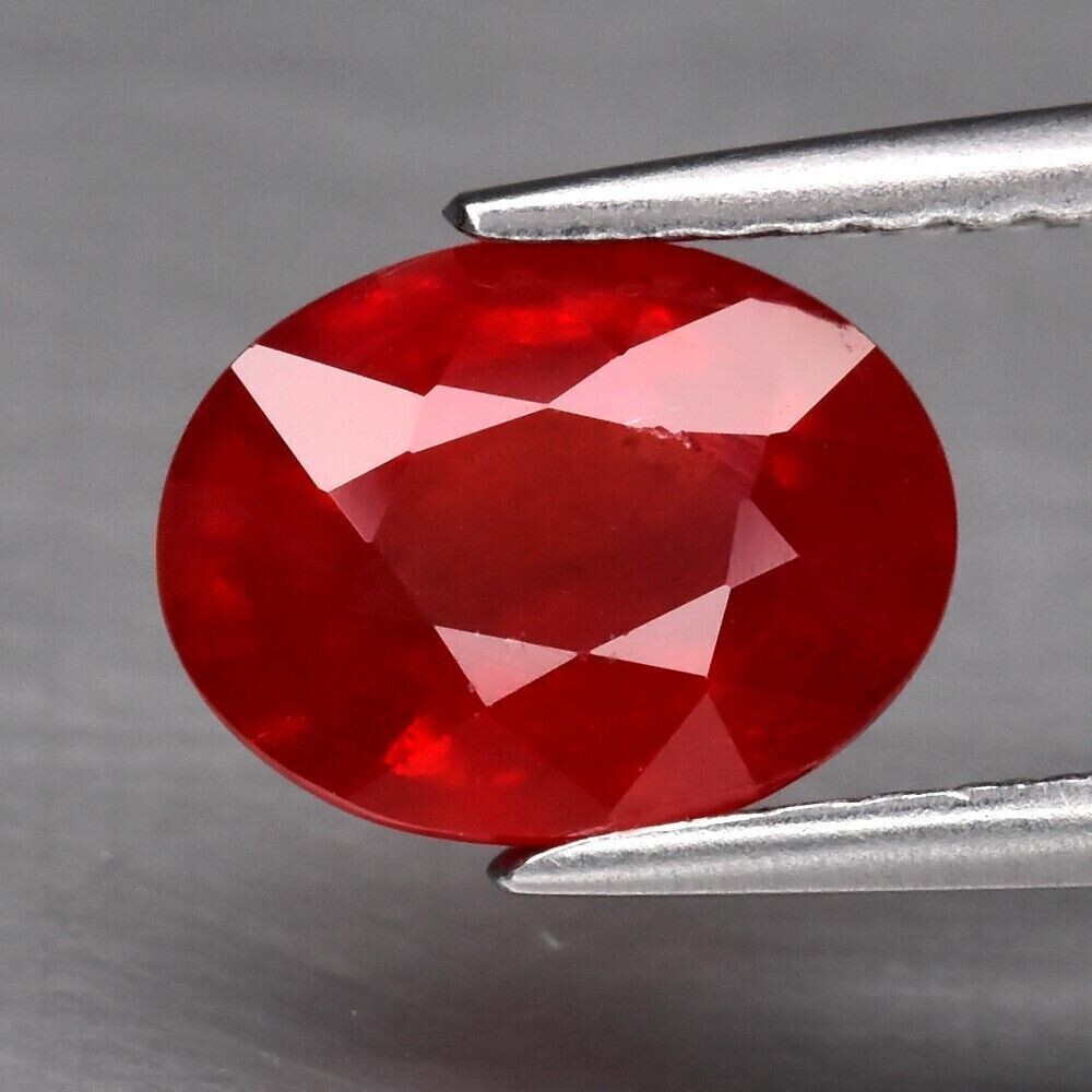 Sapphire, Orangy Red Approx.  1.5cwt.  Natural Earth Mined. 7.8x6x3.8mm. See video