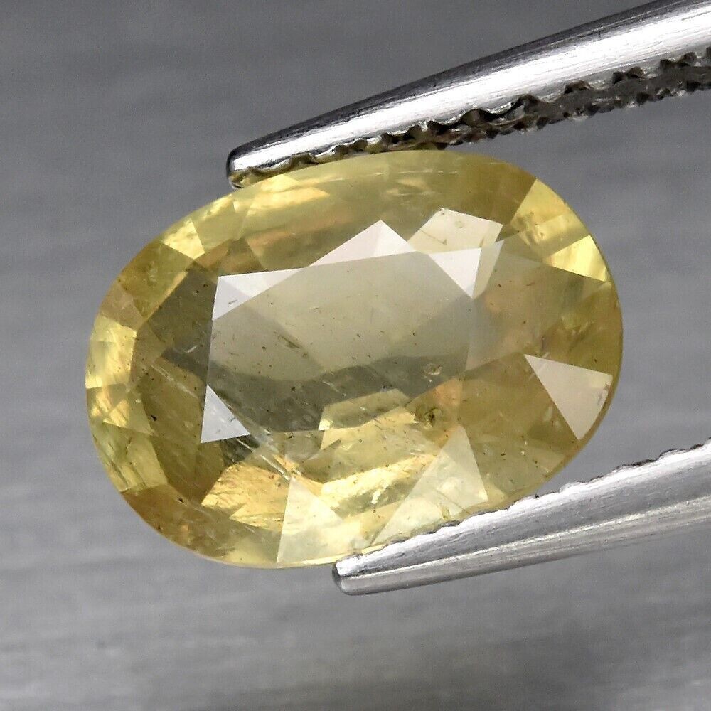 Sapphire, Yellowish Green. Unheated.  Approx.  2.cwt.  Natural Earth Mined.9x6.5x3.6mm. Master Valuer Appraised $465 See Video