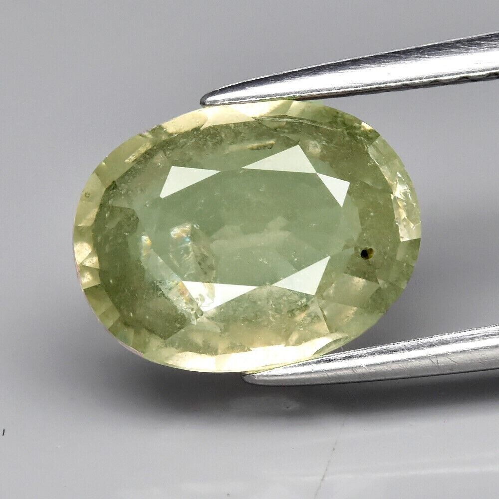 Sapphire,  Greenish Yellow Unheated. Approx.  2.89cwt.  Natural Earth Mined.10x7.7x3.9mm. See Video