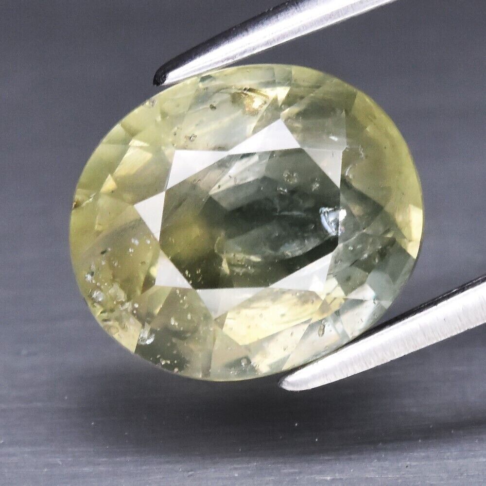 Sapphire,  Greenish Yellow Unheated. Approx.  3.6cwt.  Natural Earth Mined.9.5x8.2x5.2mm. See Video