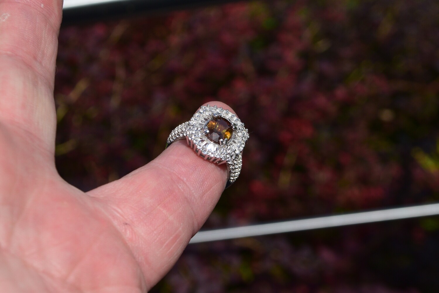 Ring Size 7. Sphene, Approx.  2.2cwt. Approx. 9x7mm. See Video
