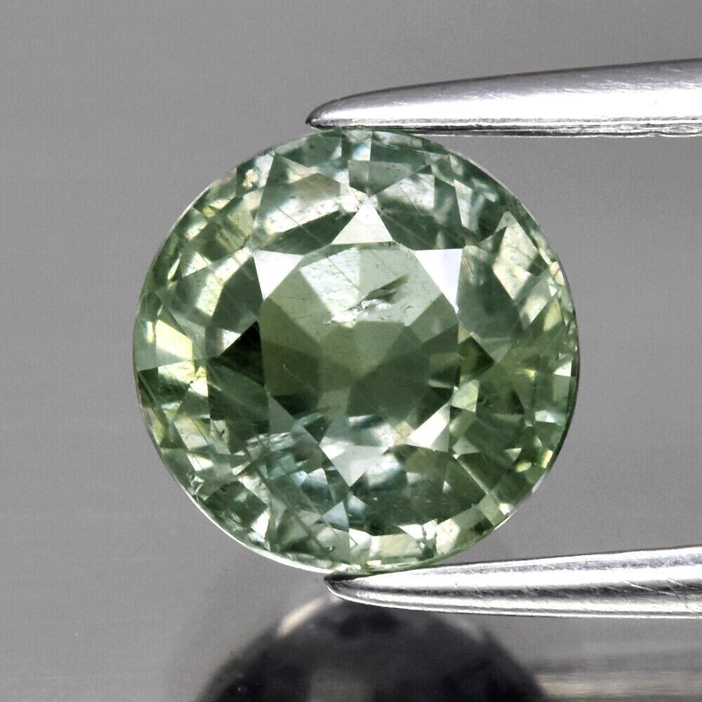 Sapphire,  Light Green Approx. 2.1ct. 7x7mm. Unheated .September Birthday. See Video