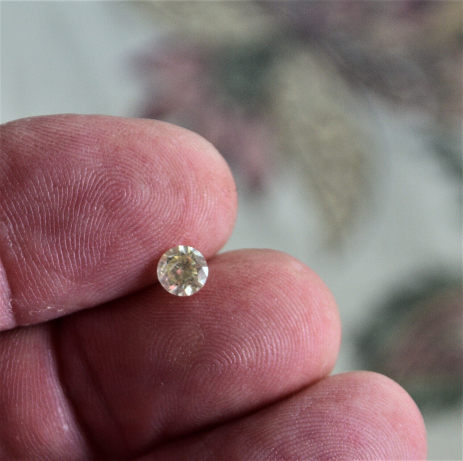 Earth Mined Diamond, Fancy Yellow. Enhanced for Clarity  .7 carat. 5.59x5.53x3.48 . See Video. IGL Report: $1,619 US