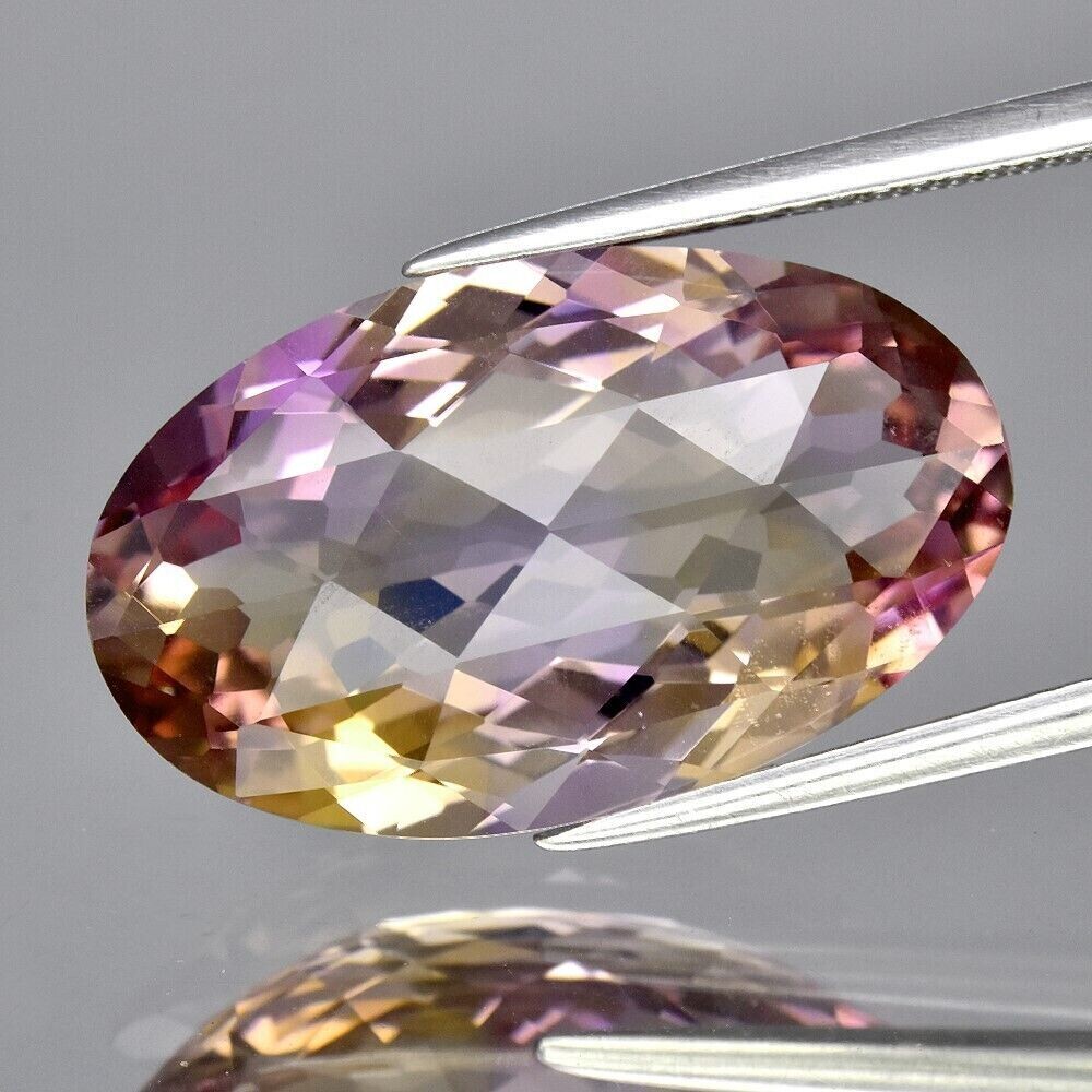 Ametrine.  10.9cwt.  Natural Earth Mined.20.2x12.3x7.9mm. Unheated. Untreated. See Video.