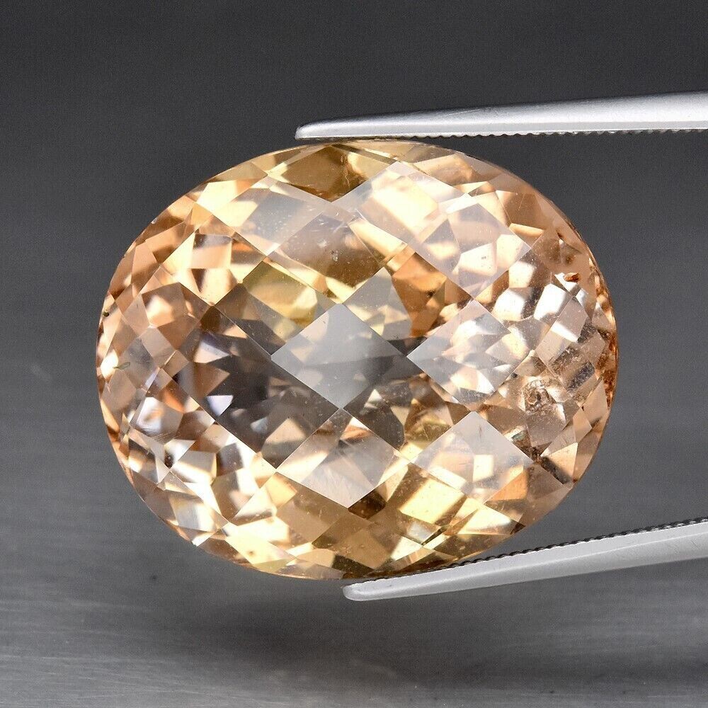 Topaz  cwt. 30.9 Topaz . Master Valuer Appraised for $2,225. 20.8x17.3x11.7mm November Birthday.  See Video.