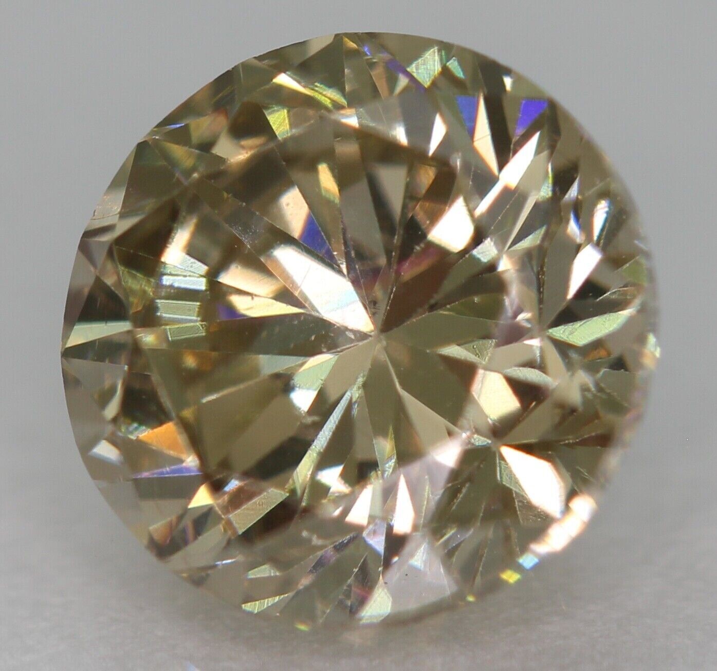 Earth Mined Diamond, 1.01cwt. Yellow . 6.18x6.4x3.95 Enhanced for Clarity . See Video.  IGL Report: $4,503 US!
