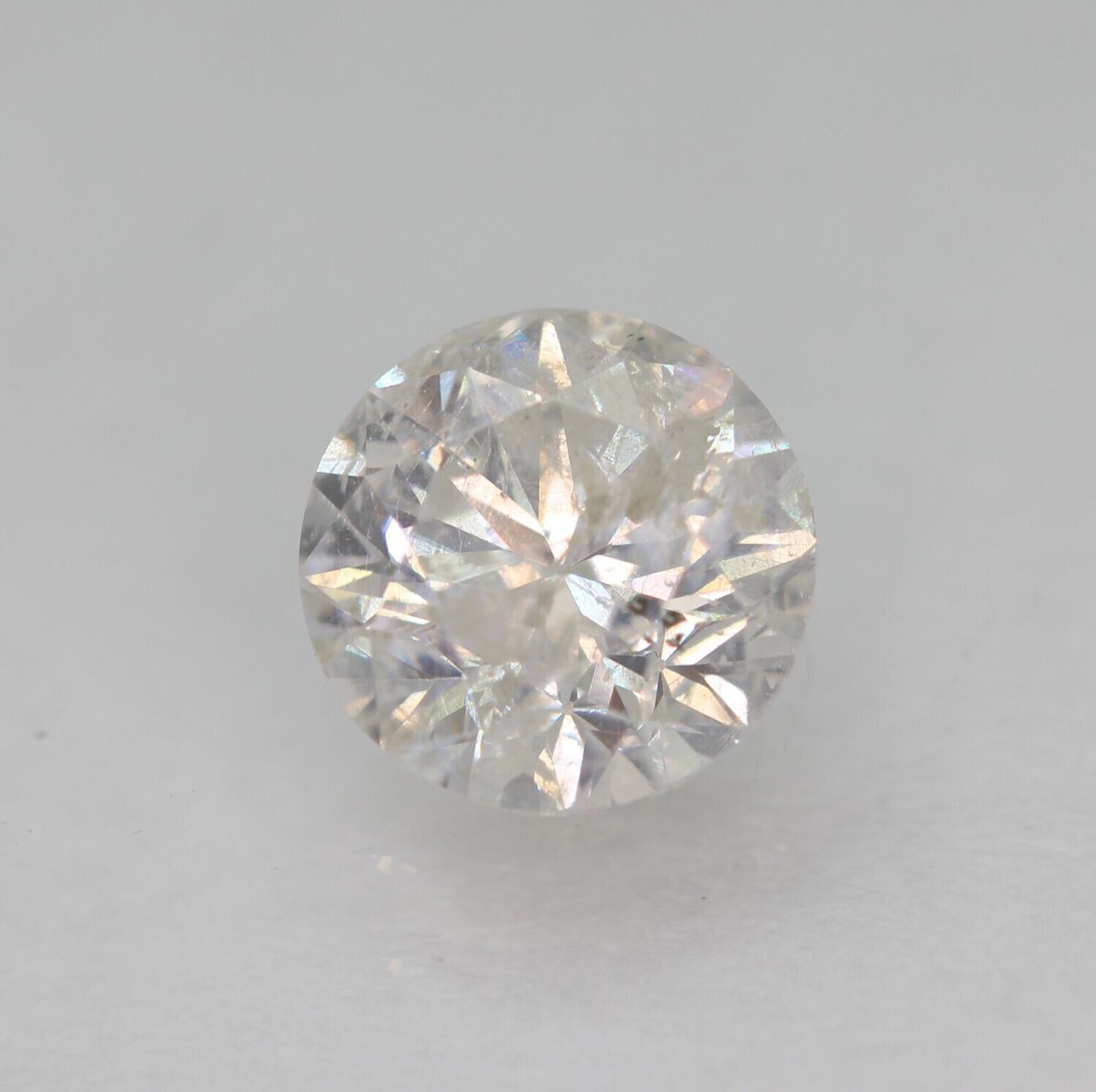 Earth Mined Diamond, .61cwt, 5.2x5.2x3.4 Clarity Enhanced. See Video.