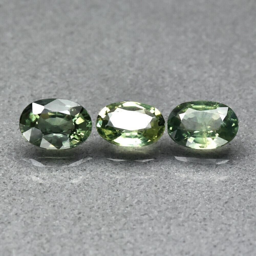 Approx. 1.8ct. total.  3pce. Sapphire. Green.  Approx. 6x4mm  September Birthday. See Video