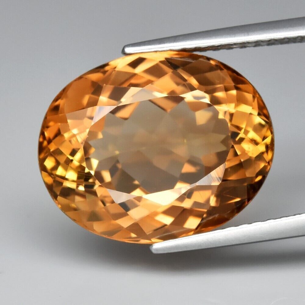 Topaz 12.07cwt, 15x12x8.3 mm. Master Valuer Appraised for $1410 November Birthday.  See Video.