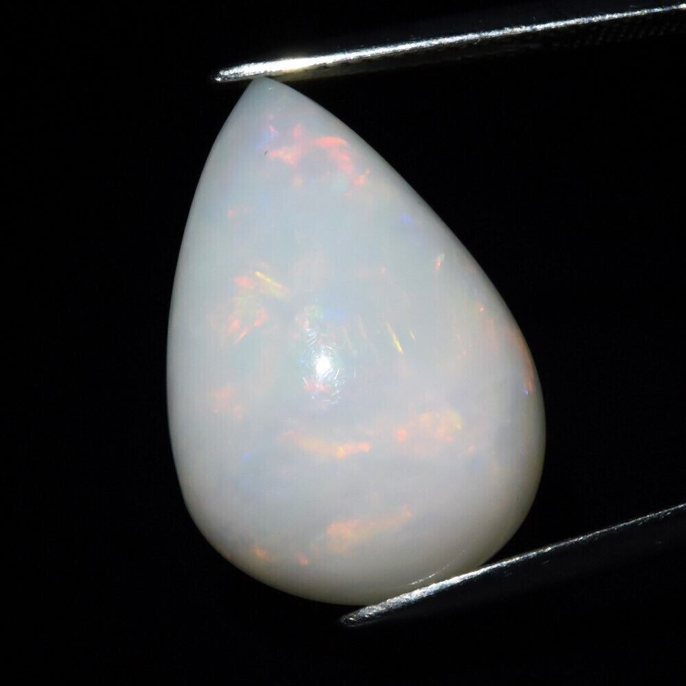 Opal .  9.86cwt . 20.8x14.3x7.4mm  Earth Mined . Oct. Birthday, See Video