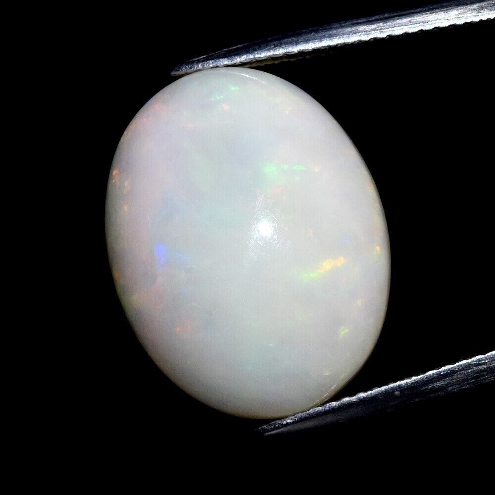 Opal . 12.54cwt.  19x15x9.4mm  Earth Mined . Oct. Birthday, See Video