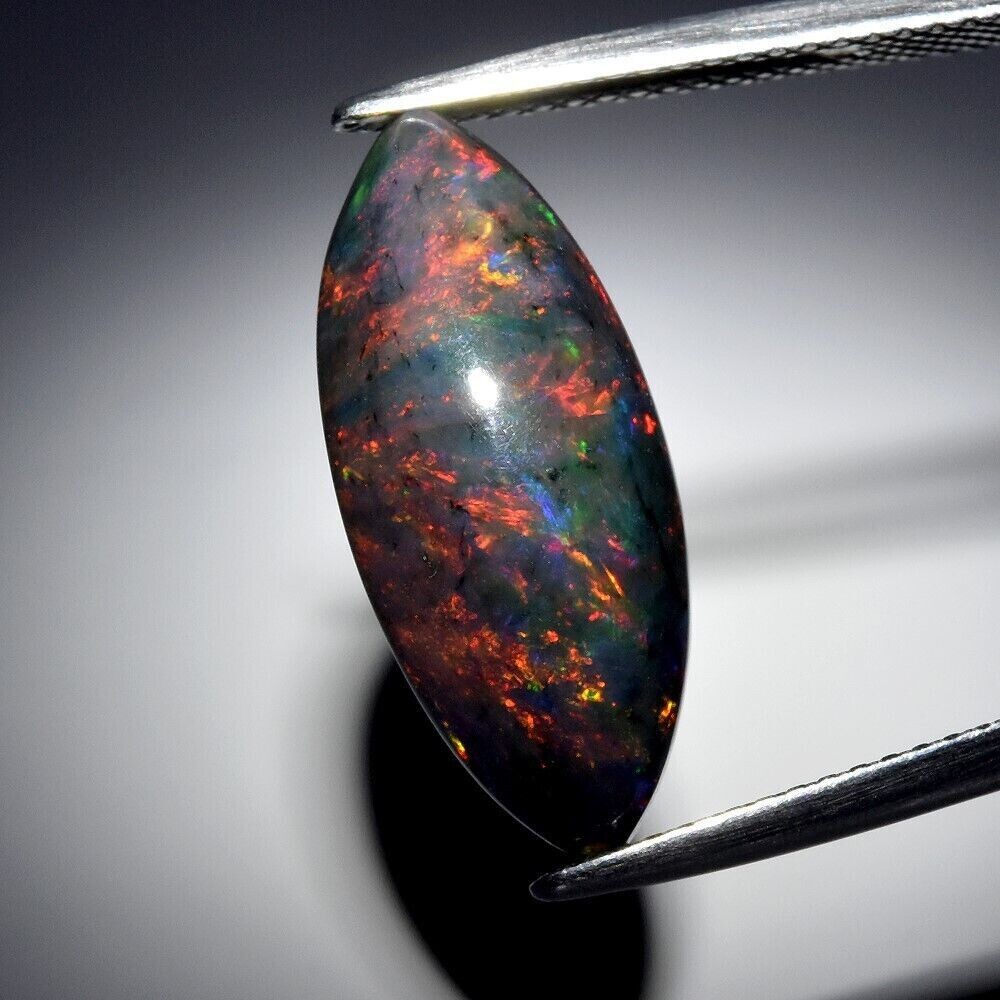 Opal . 4.32cwt.  20.2x8.5x5.7mm  Earth Mined . Oct. Birthday, See Video