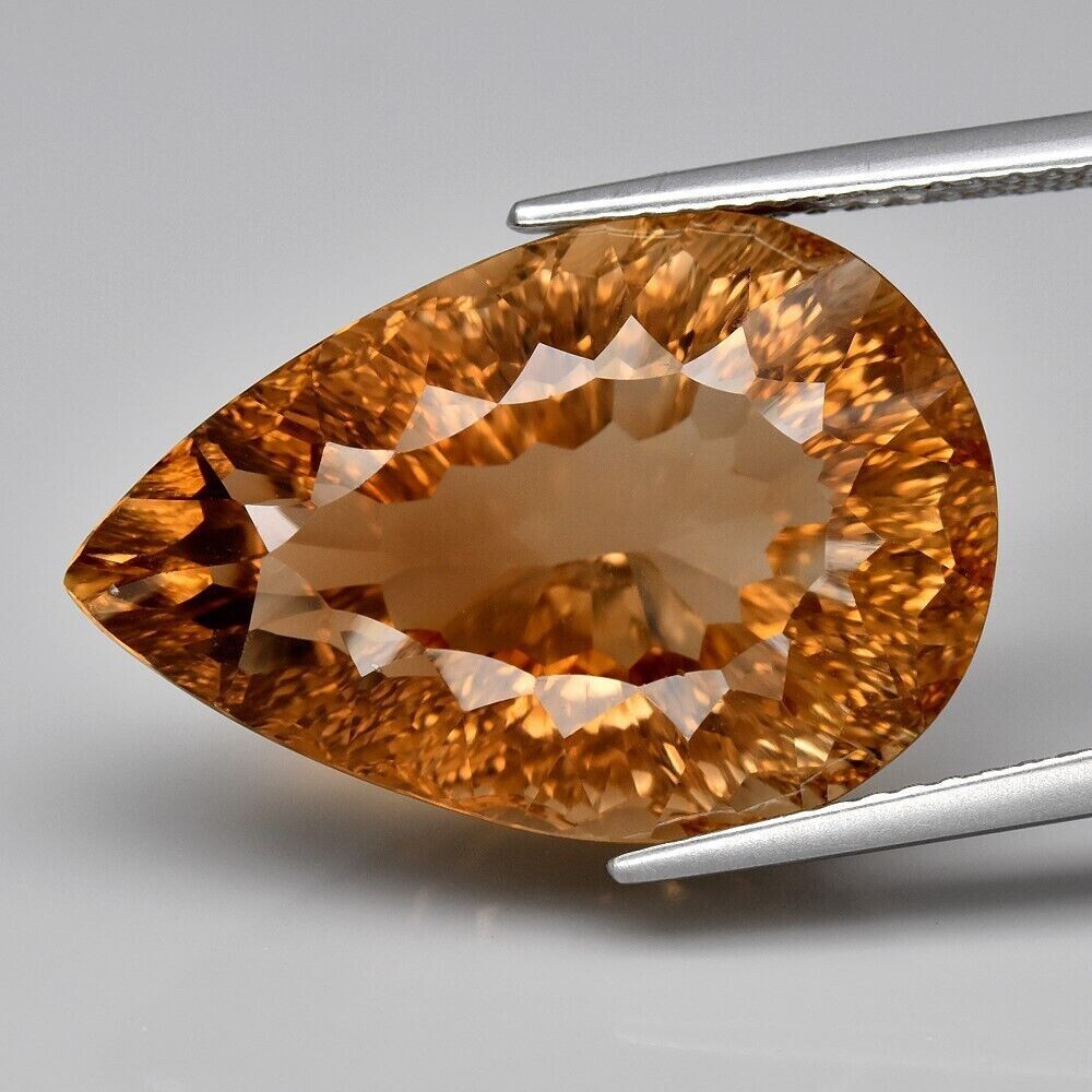 Topaz, 19.37cwt. Concave Cut. Natural Earth Mined  20.5x13.8x10mm. November Birthday. Independent Master Valuer appraised 2845..