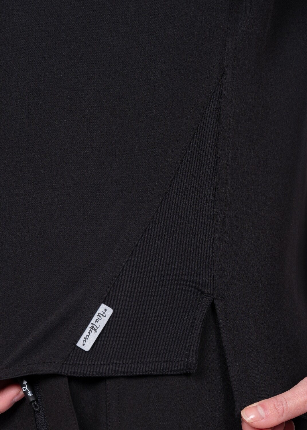 V-neck tuck in or wear out top with slanted side knit panels