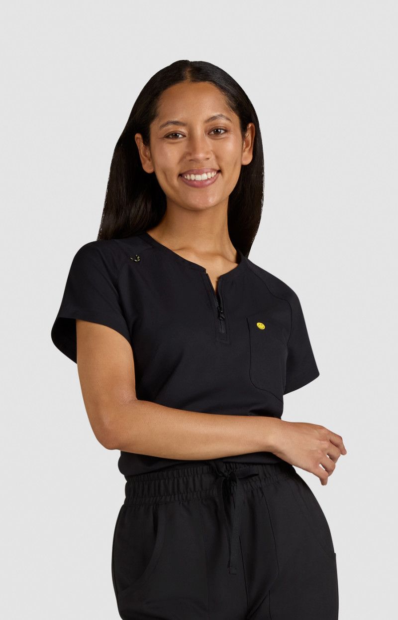koi | SmileyWorld Ecstatic Women&#39;s 1-Pocket Zipper-Neck Scrub Top