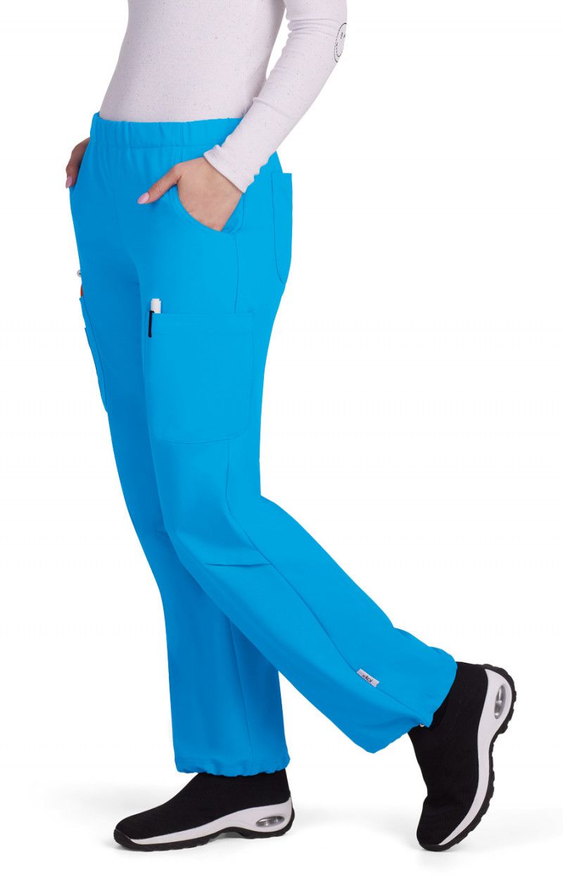 koi | SmileyWorld Jubilant Women&#39;s 7-Pocket Scrub Pant