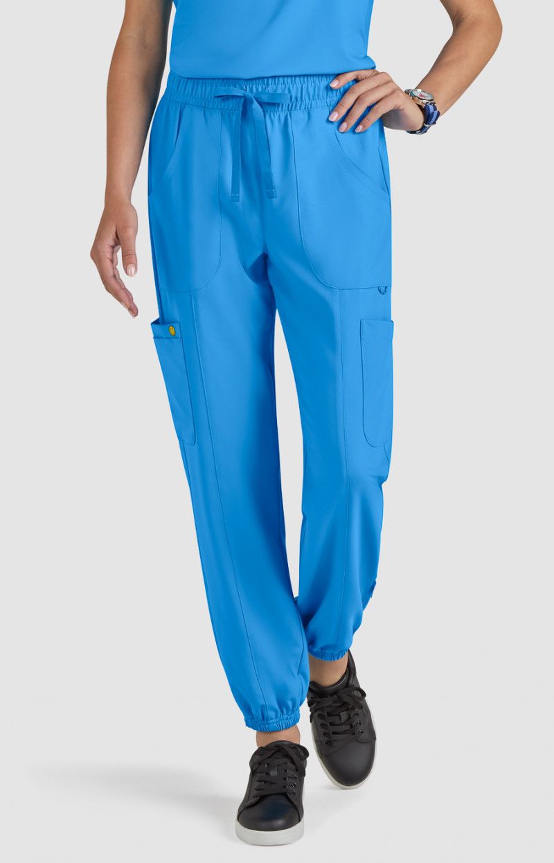 koi | SmileyWorld Jolly Women&#39;s 7-Pocket Jogger-Style Scrub Pants