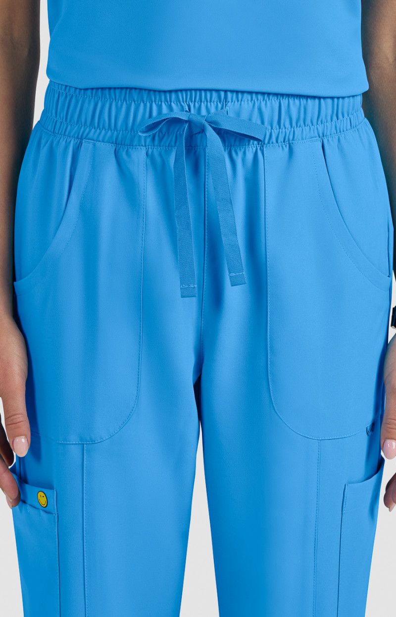 koi | SmileyWorld Jolly Women&#39;s 7-Pocket Jogger-Style Scrub Pants