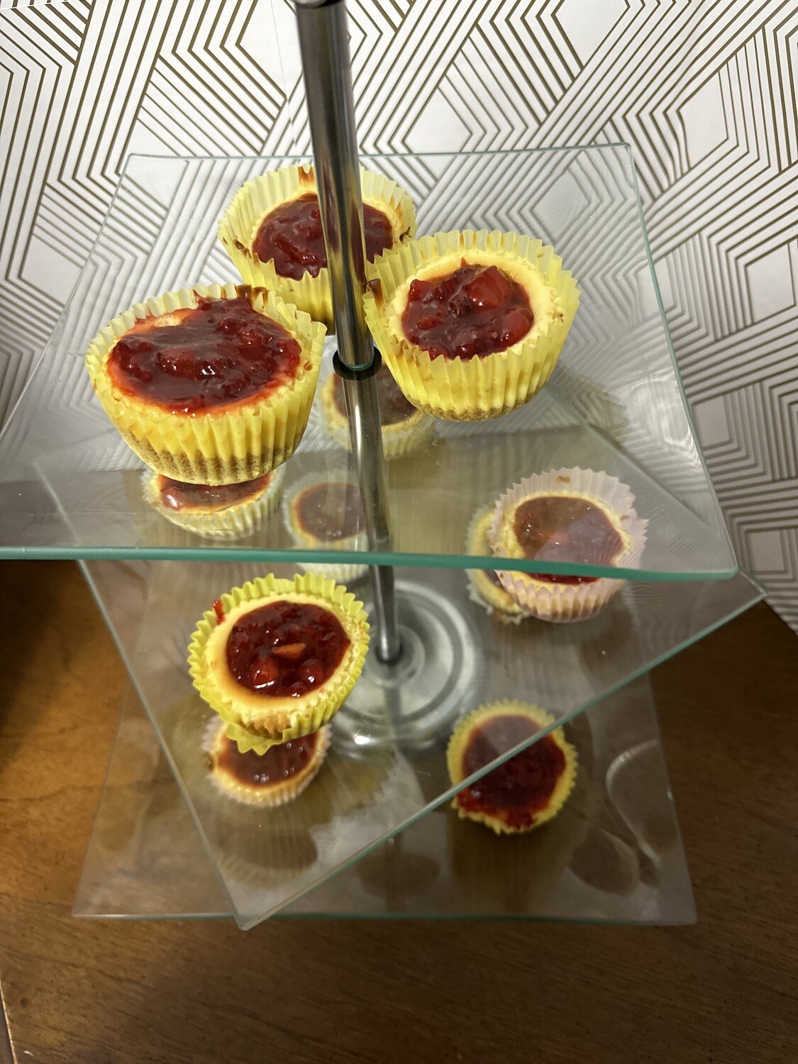Mini cheesecakes cups with fresh strawberry filling
