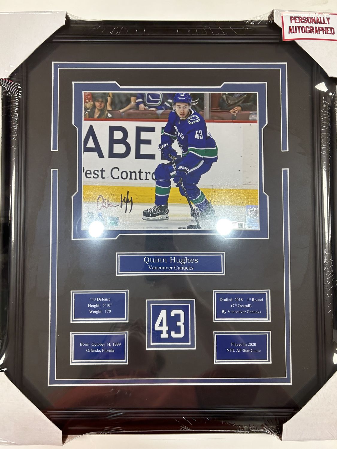 QUINN HUGHES - AUTOGRAPHED VANCOUVER CANUCKS 16X20 FRAME