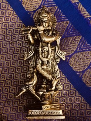 Brass flute krishna idol