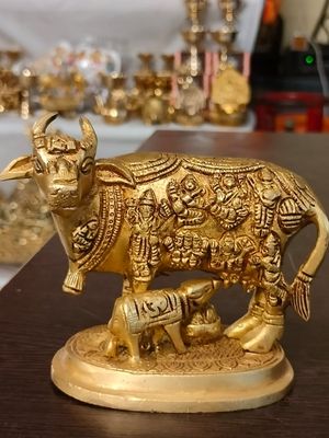 Brass cow and calf idol