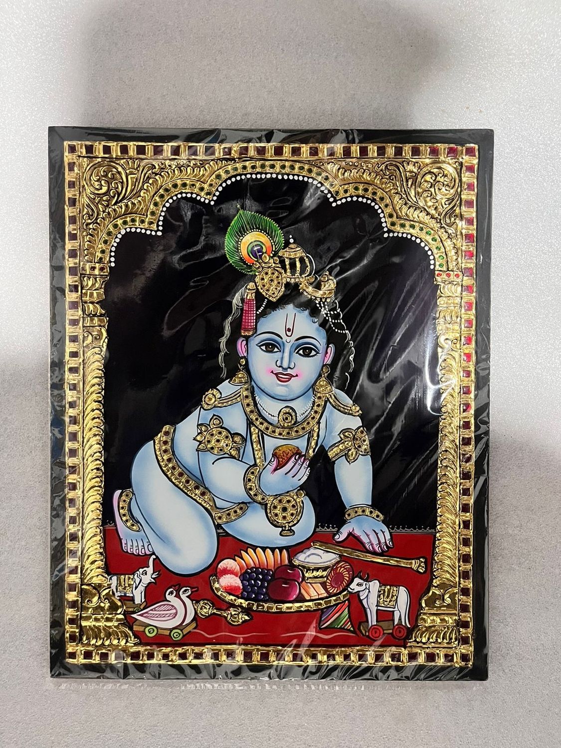 Krishan Tanjore painting  12 inches by 15 inches - frame size extra