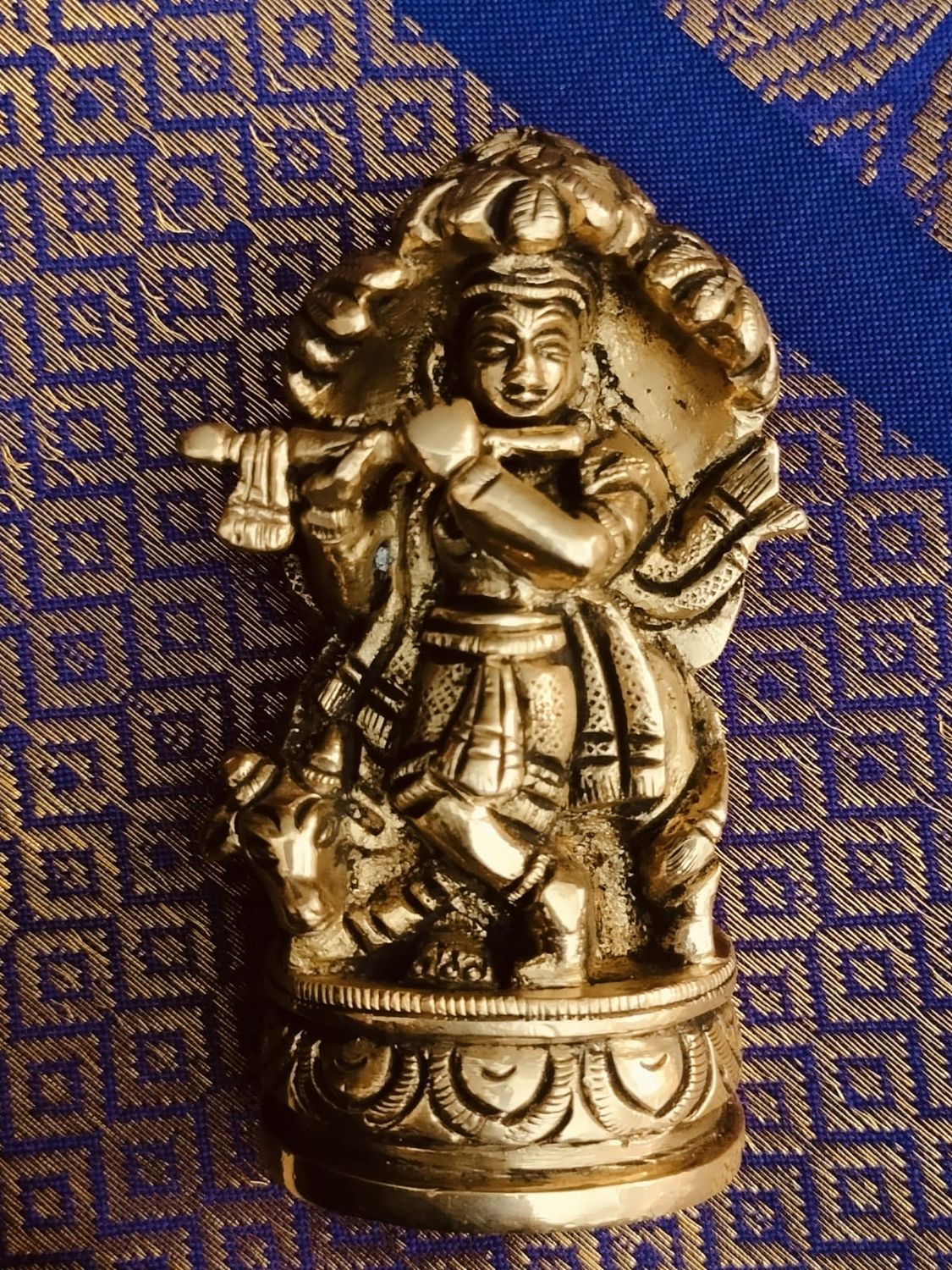 Brass cow krishna