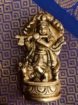 Brass cow krishna