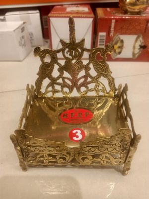 Brass simhassana