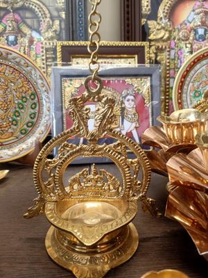 Brass wall hanging diya