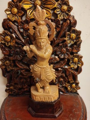 Wooden krishna idol