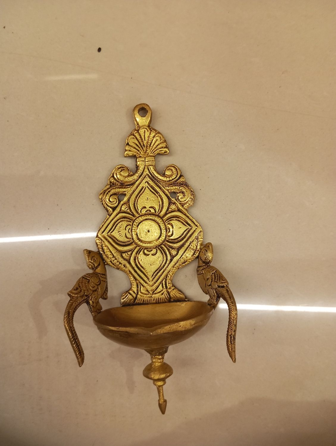 Brass wall hanging