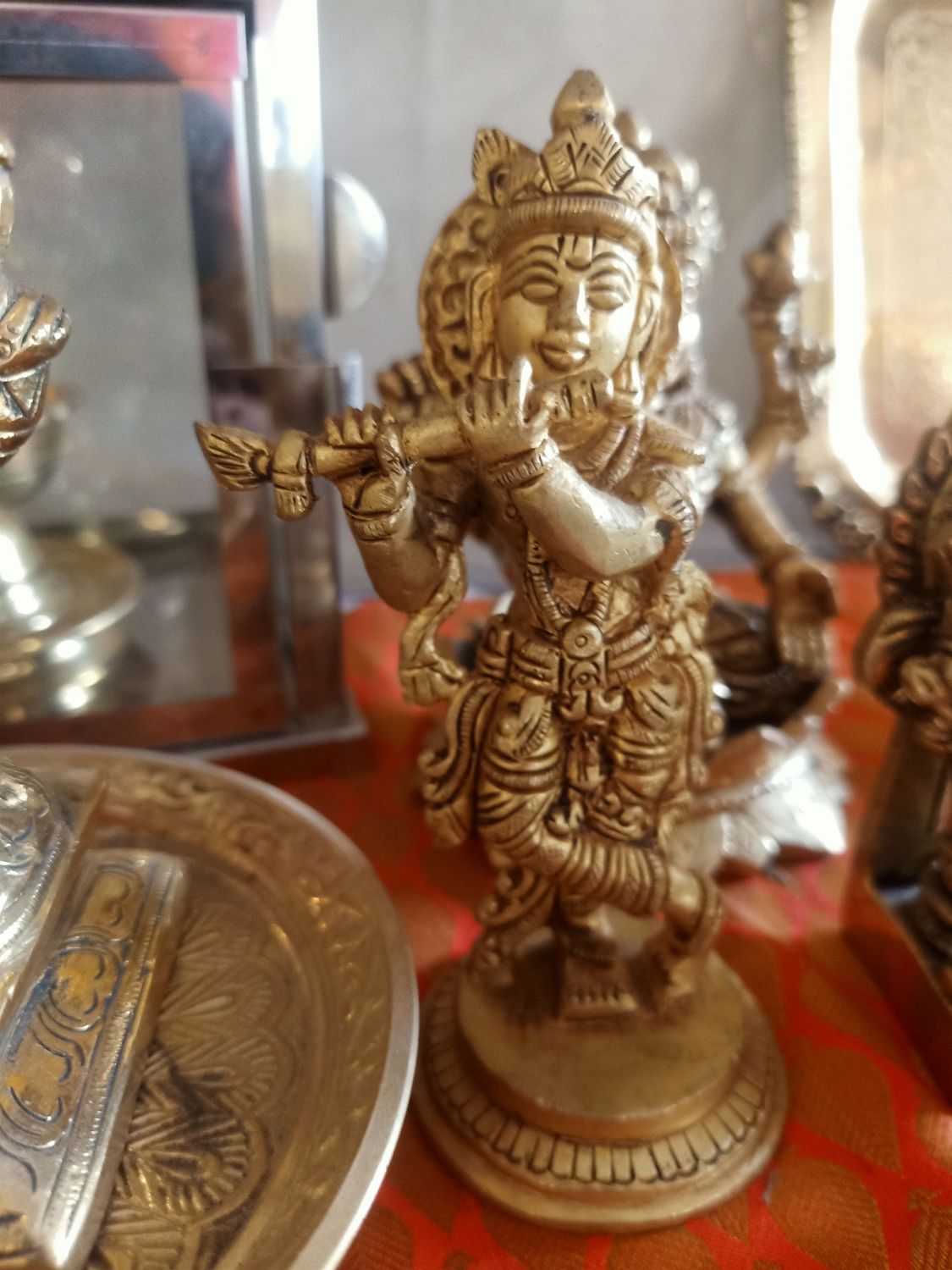 Brass krishna idol