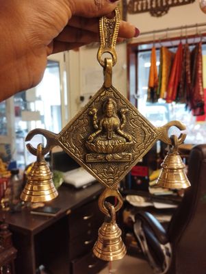 Brass lakshmi wall hanging with bell