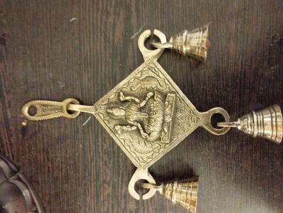 Brass lakshmi wall hanging with bell