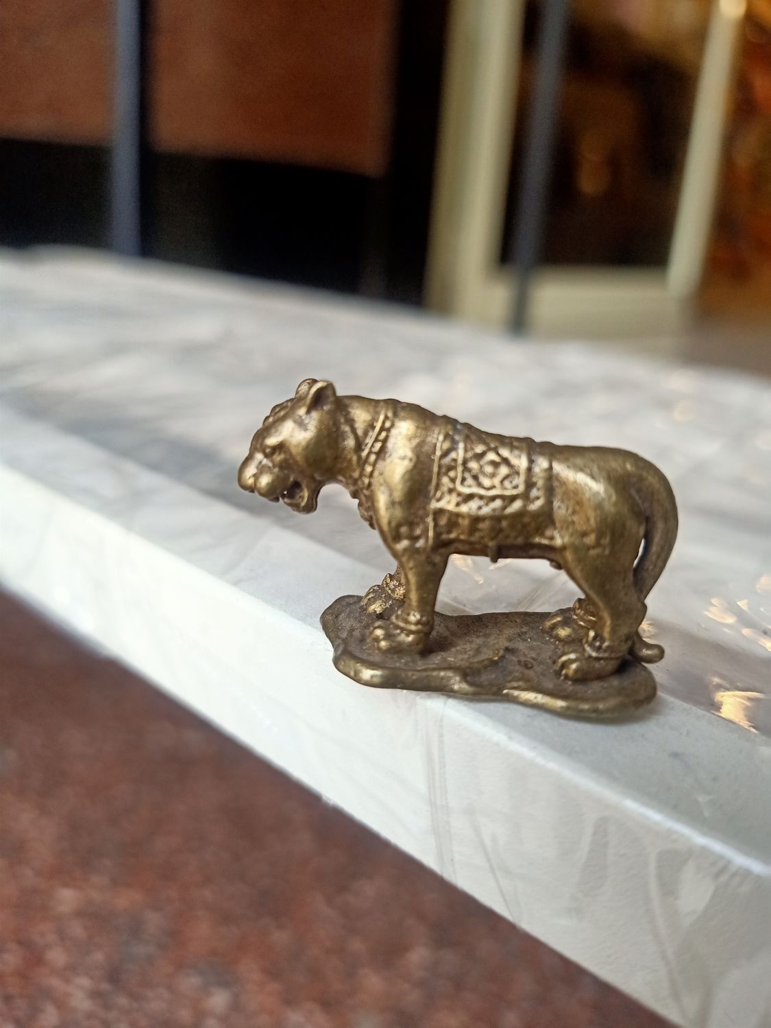 Brass tiger