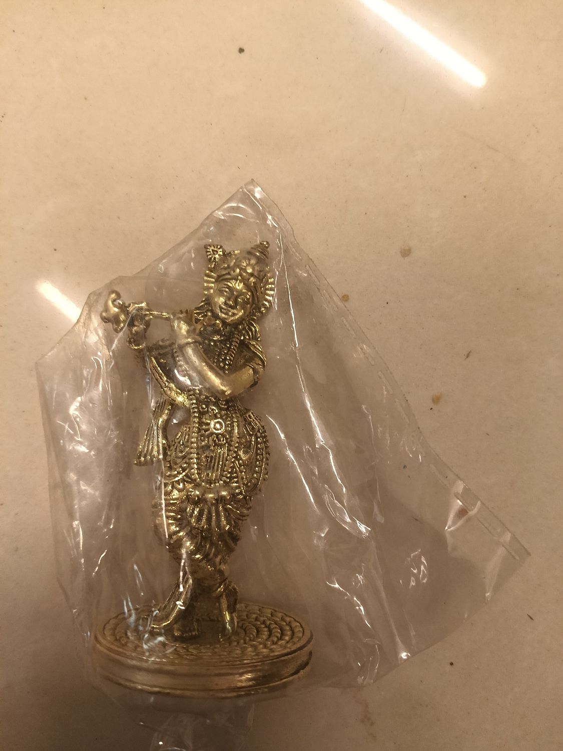 Brass krishna idol