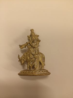 Brass cow krishna
