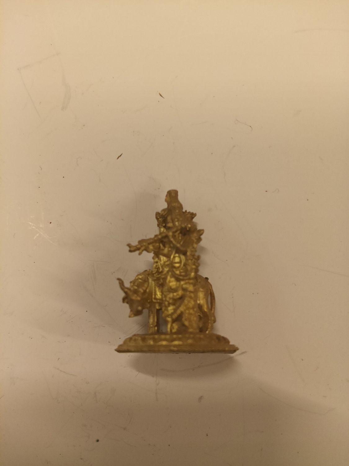 Brass krishna idol