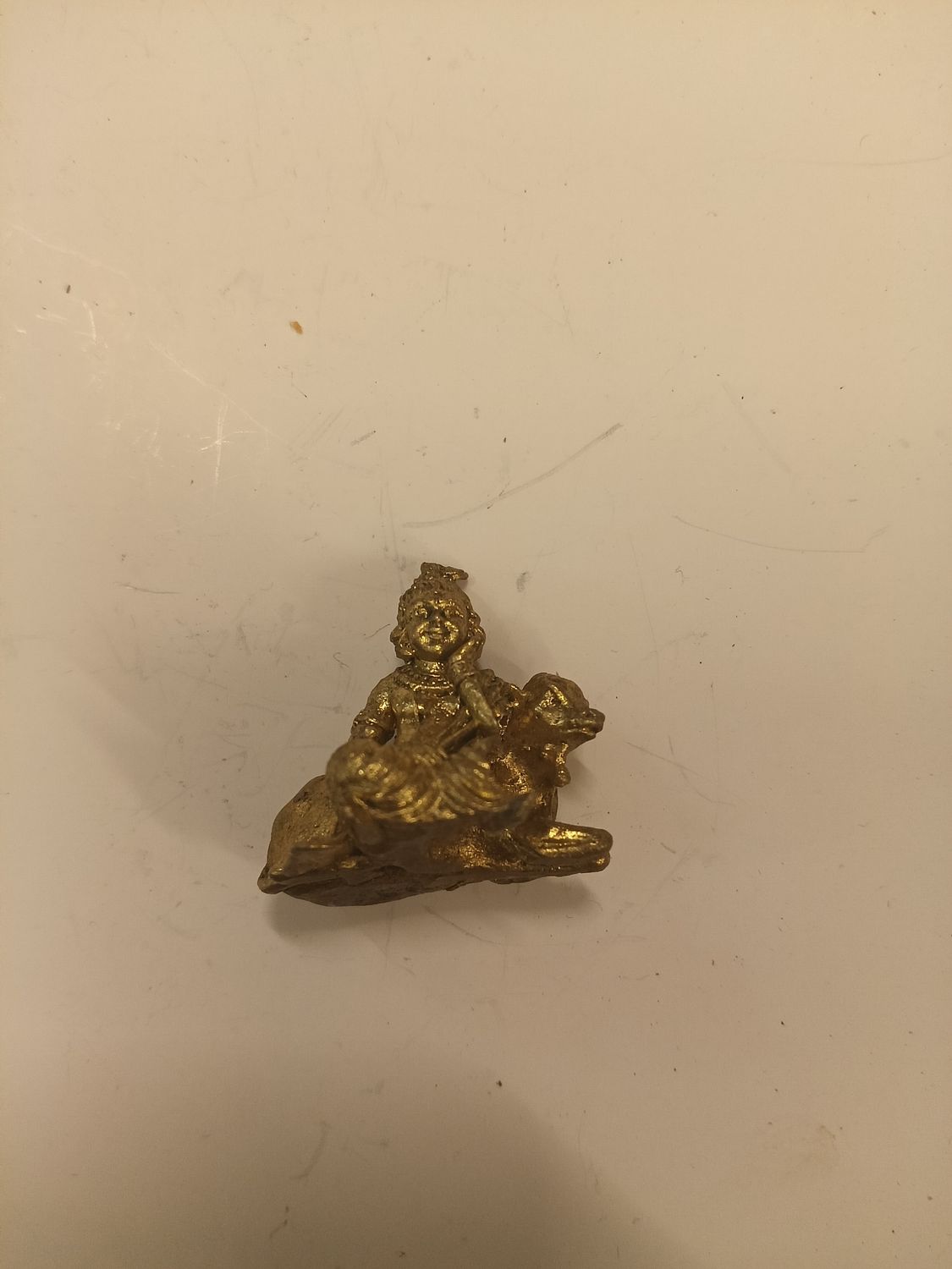 Brass cow krishna