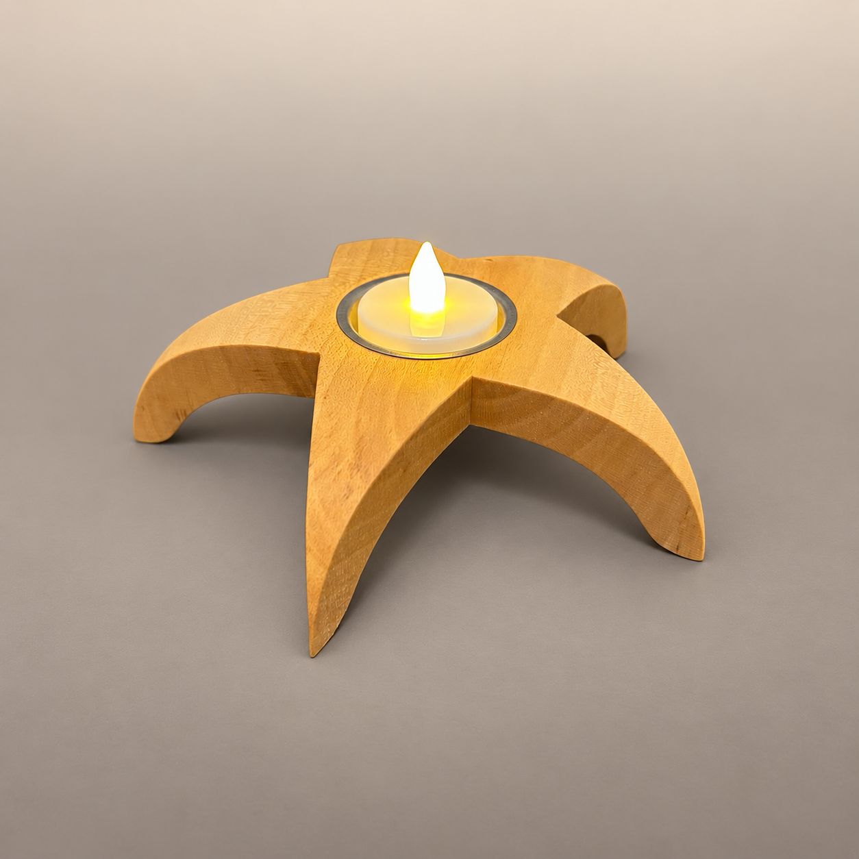 Teelicht "Stern" aus Esche (Ø ca. 17 cm) Teelicht "Stern" aus Esche (Ø ca. 17 cm)