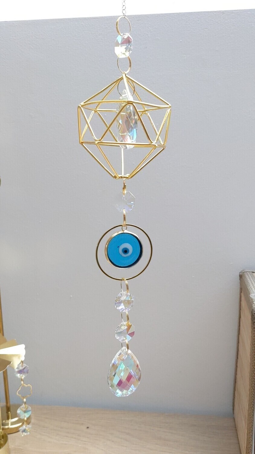 Attrape soleil &quot;losange et œil de protection en verre&quot;