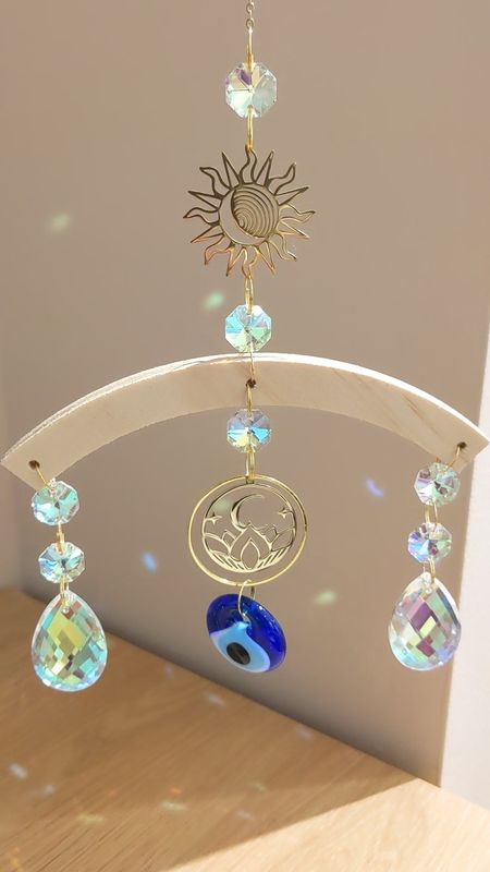 Attrape soleil support bois &quot;œil de protection bleu&quot;