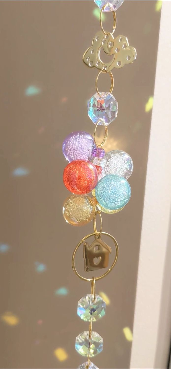 Attrape soleil à chaîne unique &quot;laisse-toi porter...&quot;