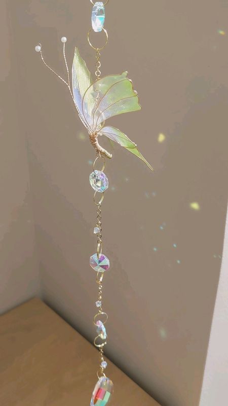 Attrape soleil à chaîne unique "papillon"