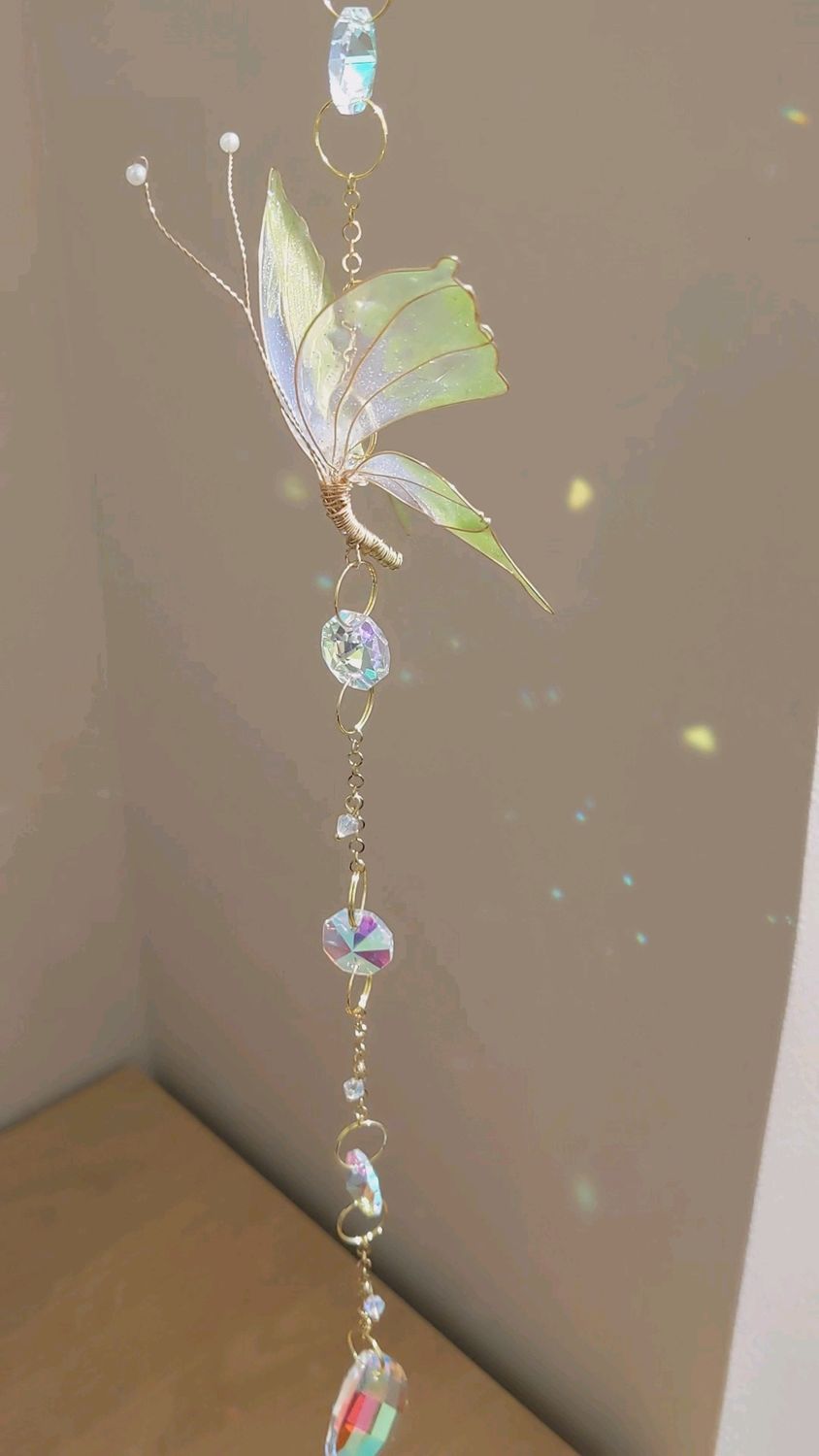 Attrape soleil à chaîne unique "papillon"