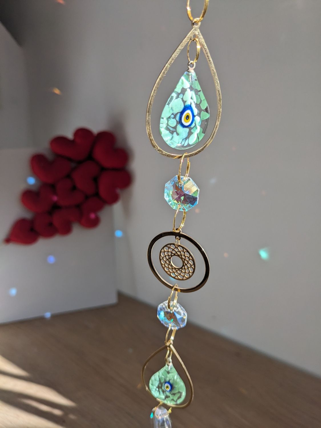 Attrape soleil "Nazar en verre tacheté vert"