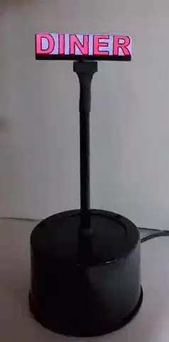 DINERROTATINGSIGN